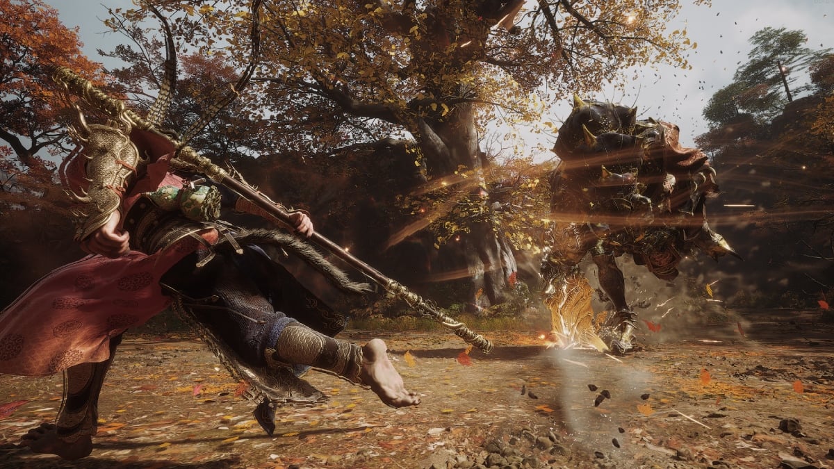 Black Myth Wukong review cover with Wukong fighting an enemy with his staff